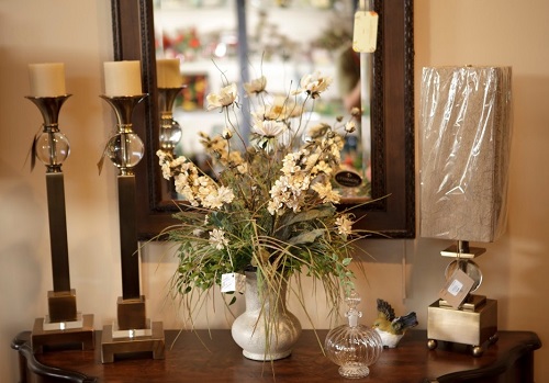 Place mirror behind flowers and vase.