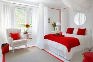 Romantic white-red bedroom decor for couples.