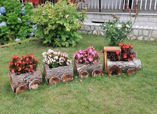 Plants pot in every bogie of train for garden decor.