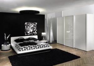 Black and white flower theme wall art bedroom idea.