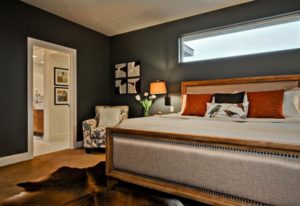 Dark color bedroom decor for basement.