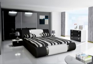 Lovely bedroom interior decoration in black and white color combination.