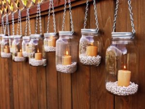 Mason jar holding candle to decorate home for diwali