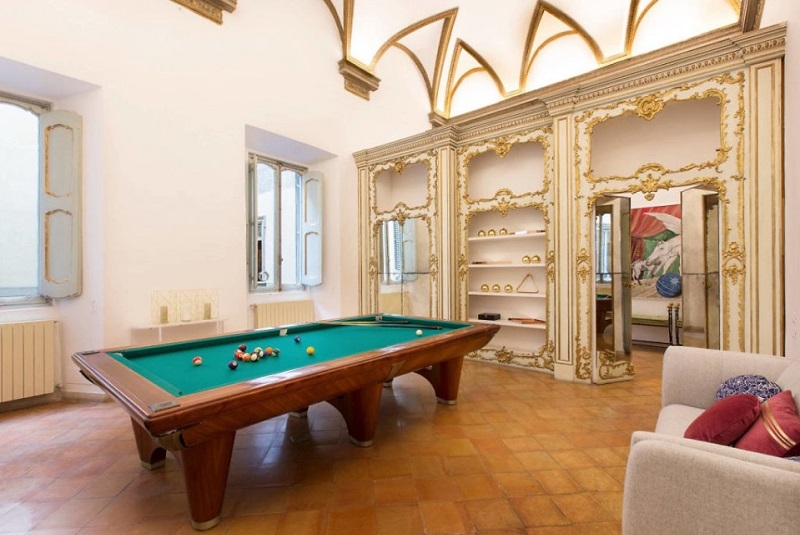 Billiards room decor in Rome's Costaguti Experience apartment